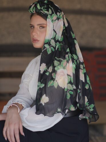 Long black scarf with a green floral print